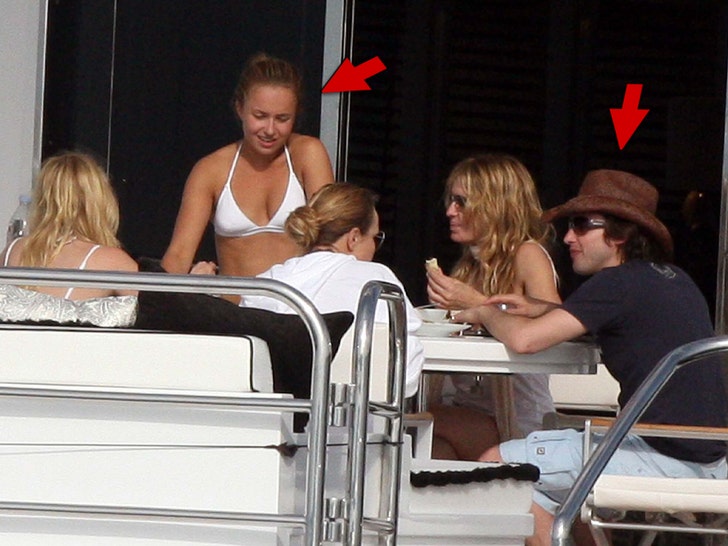 Hayden Pannettiere and James Blunt relaxing on a boat splash
