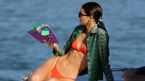 Kendall Jenner Reads a Book in a Tiny Bikini on a Yacht