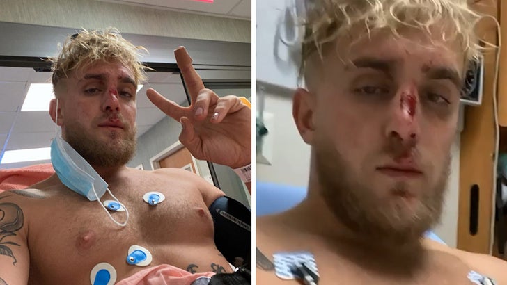 Jake Paul gets gotcha hat tattoo in taunt to Floyd Mayweather after mass  brawl breaks out at brother Logans face off  The US Sun