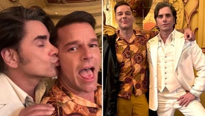 1202-John-Stamos-Ricky-Martin-Who'd-You-Rather-PRIMARY