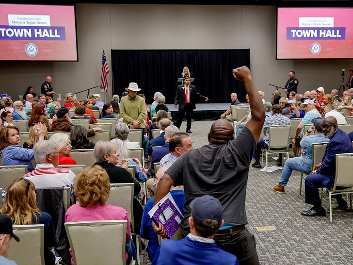 Protesters at Marjorie Taylor Greene Town Hall Meeting