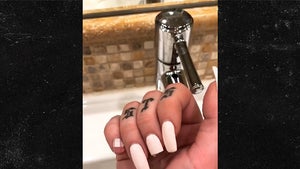 Iggy Azalea Loses Fingernail In Shower Fall