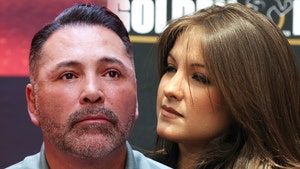 oscar de la hoya and millie corretjer getty 1