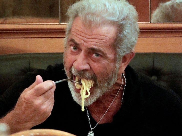 Mel Gibson Gets Silly With His Pasta While Dining Solo In Rome