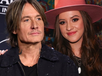 keith urban Maggie Baugh getty comp