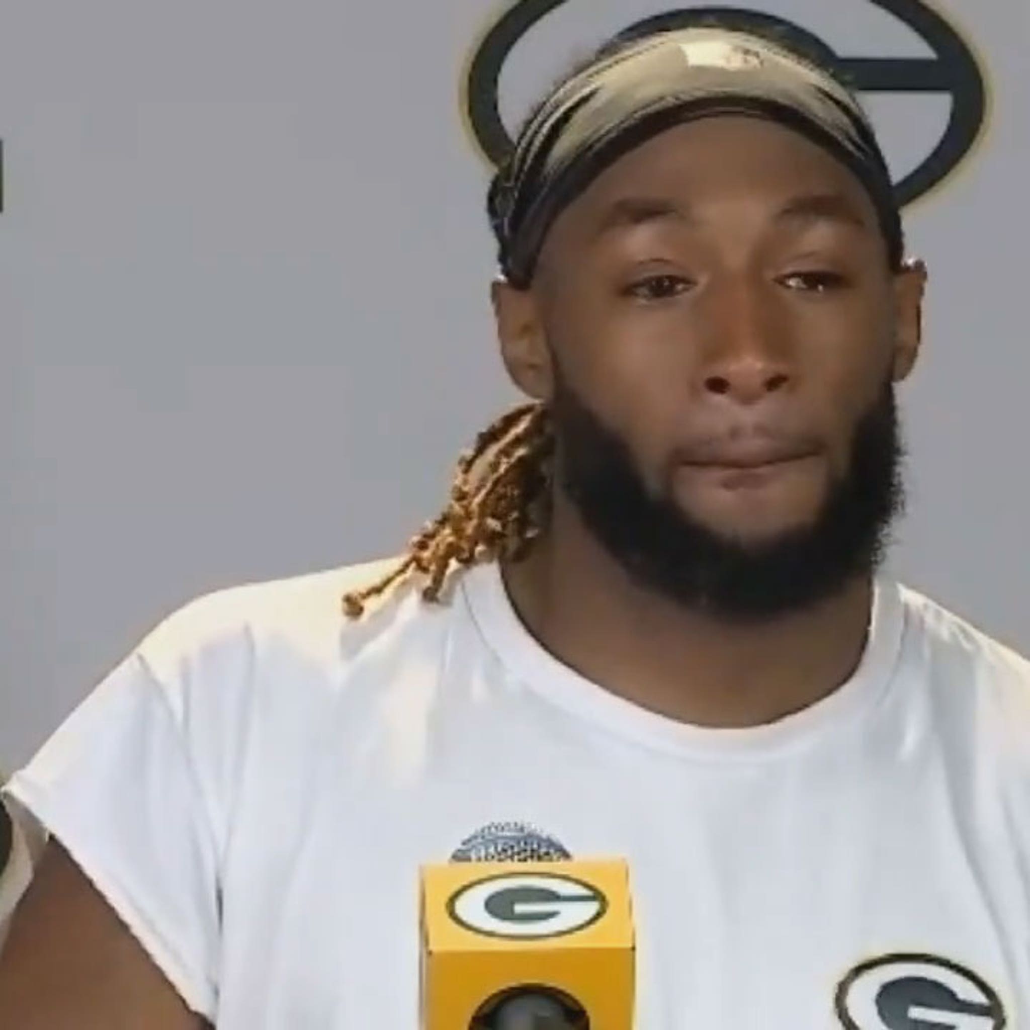 NFL on ESPN - Aaron Jones is wearing a necklace with a photo of him and his  late father before the Green Bay Packers' SNF game 