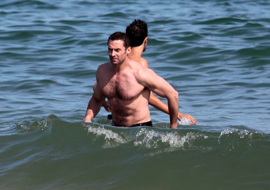 Hugh Jackman Goes Topless to Barcelona Beach