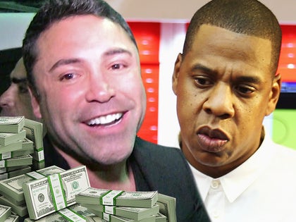 1123_oscar_de_la_hoya_jay_z_getty_tmz