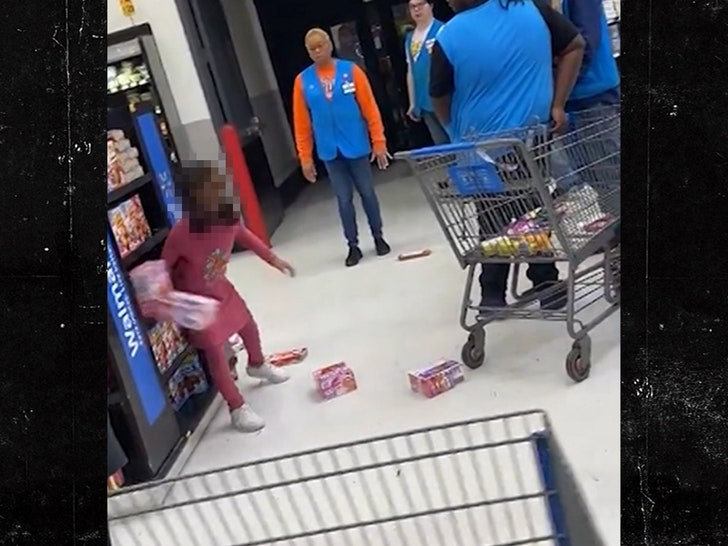 120224-walmart-kid-throwing-boxes