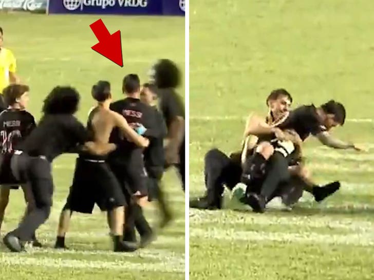 Lionel Messi tackled by fan