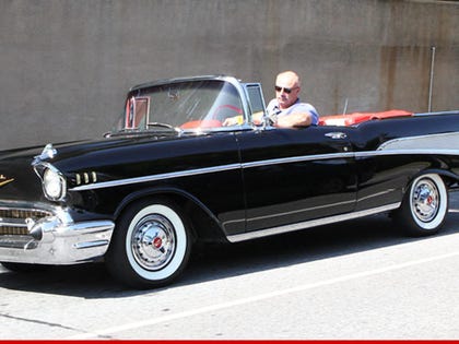 0827_dr_phil_car_article_wm_tmz_x17_red