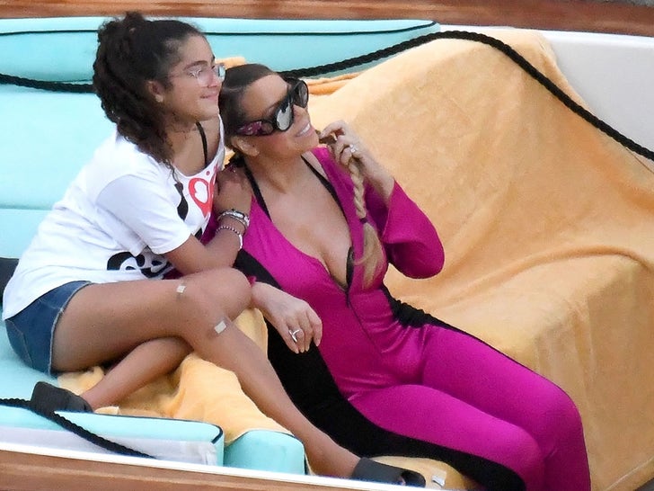 Mariah Carey Rocks Pink Swimsuit, Hangs with Kids Off Amalfi Coast