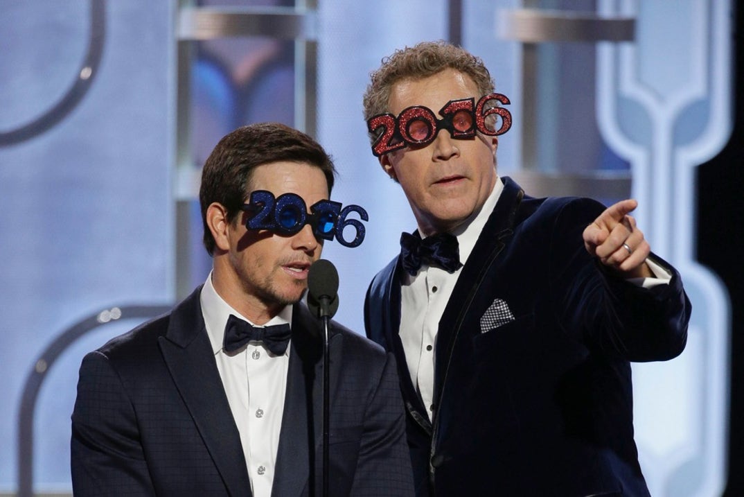 2016 -- Mark Wahlberg and Will Ferrell have some fun presenting an award, still celebrating the start of the new year with goofy 2016 glasses.