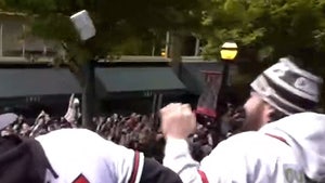 Braves Players Hilariously Pelted With Beers At World Series Parade