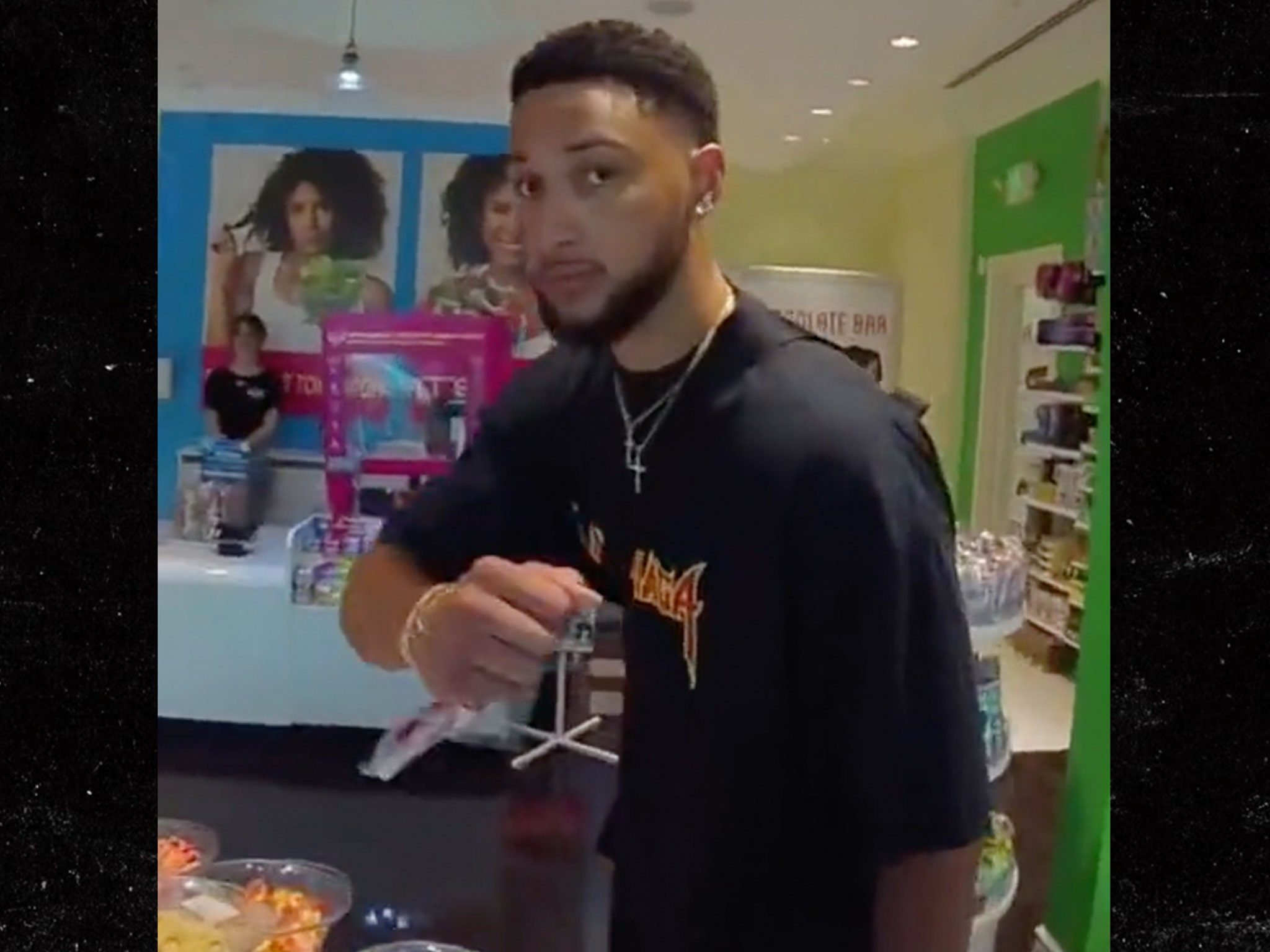 Watch: Ben Simmons gets heckled while shopping at the mall inside a candy  store