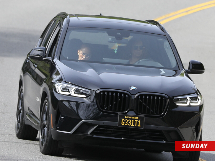 Jlo driving around in car on Sunday in Beverly Hills