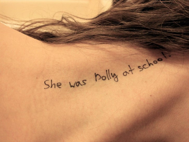 New Epstein Photos Feature 'Lolita' Quotes Written on Woman's Body