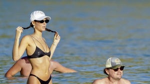 Leonardo DiCaprio And Vittoria Cerretti On A Beach In St Barts