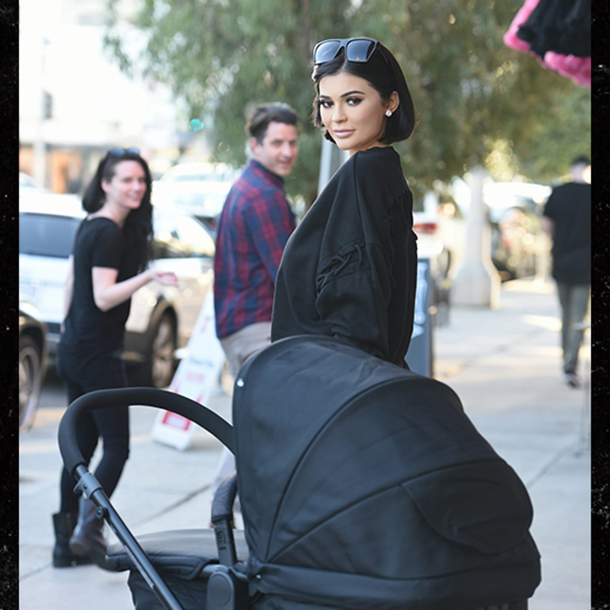 Kylie Jenner: New Mom's Wax Figure Steps Out with Stroller