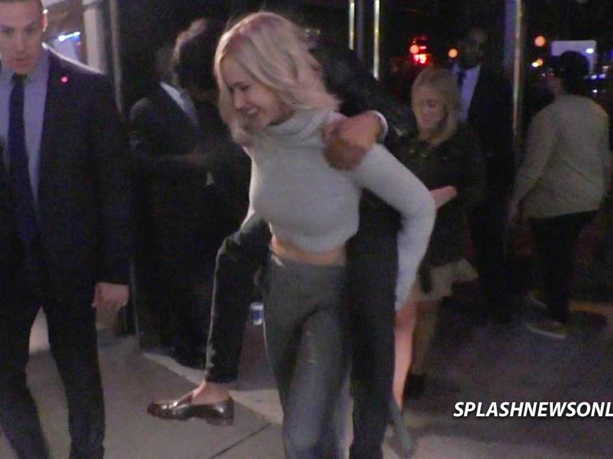 Jennifer Lawrence Gives Dudes Piggyback Rides — While Wearing Heels