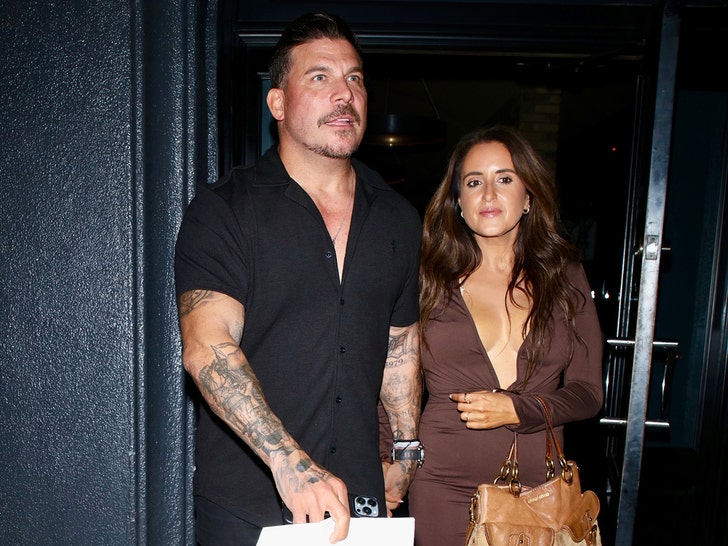 Jax Taylor and Lori Krebs hold hands while leaving Craig’s bg 2