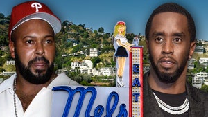 suge-knight-diddy-mels-diner-getty-1