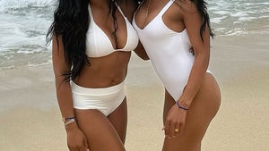 0709-Malika-and-Khadijah-Haqq-White-Swimwear-HERO