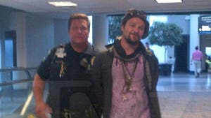 Bam Margera -- Detained & Cuffed in Airport ... for Reeking of Booze