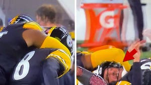 Aaron Rodgers and Broderick Jones