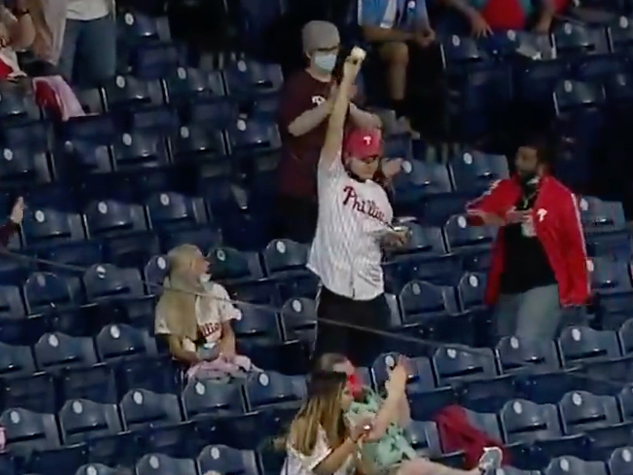 A frustrated young Phillies fan missed two foul balls, but the