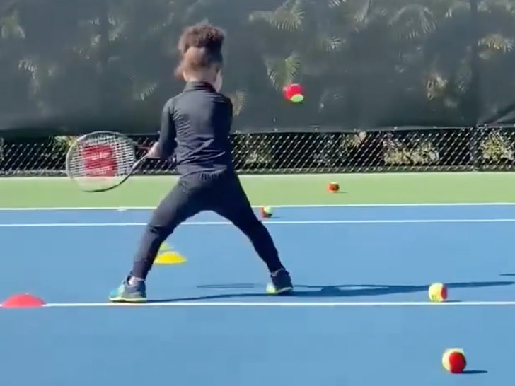 Serena's daughter backhand swing
