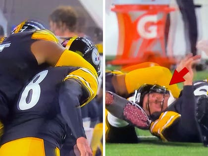 Aaron Rodgers and Broderick Jones