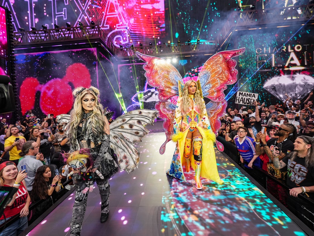 Alexa Bliss and Charlotte Flair make a beautiful entrance for their 4-way tag match