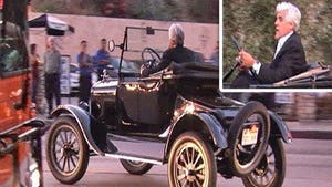 Jay Leno Gets a Ride from a Model ... T