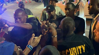 Leave it to Diddy to flip the strip club game on it's head -- causing chaos outside Magic City in Atlanta by pulling out a fat stack of cash, handing it to fans ... and then bolting with Lori Harvey.