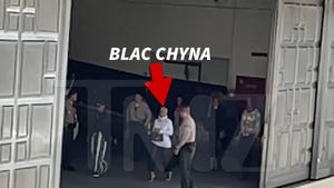 Blac Chyna Surrounded by Cops as She Navigates Courthouse in Kardashian Trial