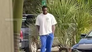 Diddy Seen on Video Pacing Around Miami Airport After Raids at Both Homes