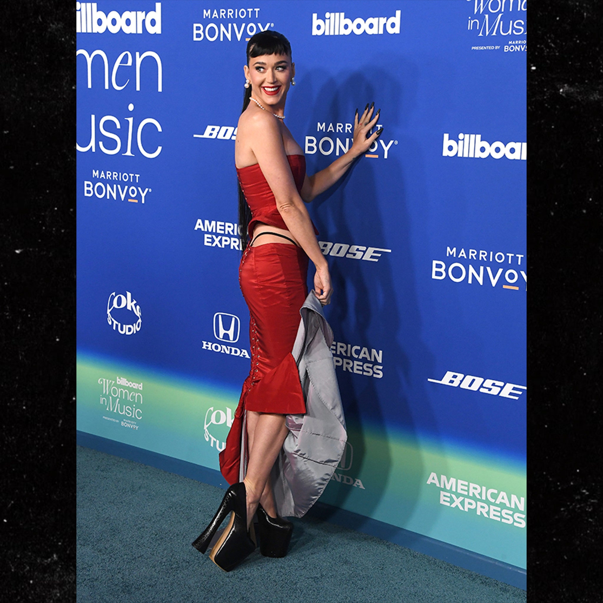 Katy Perry Wears Sexy Laced-Up Red Dress, Exposes Butt in G-String