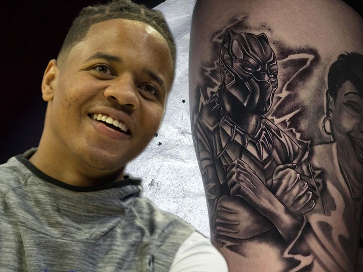 1124-markelle-fultz-and-tattoo-artist-Markelle and Roly T-Rex-02