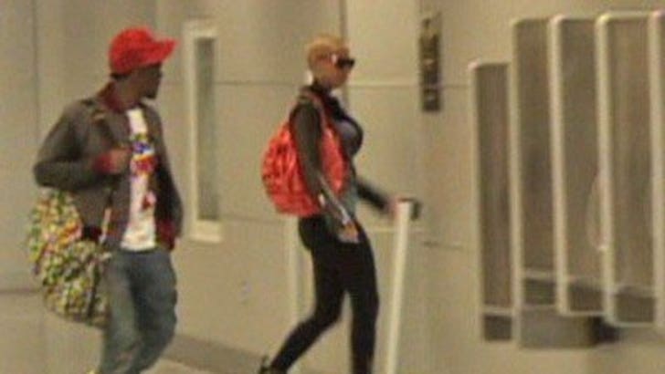 Kanye & Amber: Click to watch