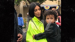 Kim Kardashian Stands Out at Disneyland with Her Kids