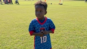 3 year old playing soccer