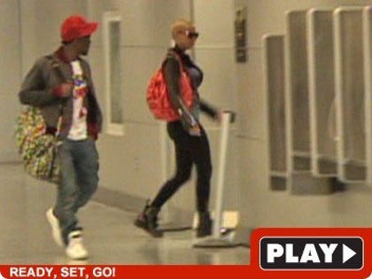 Kanye & Amber: Click to watch