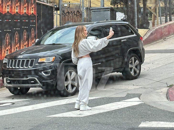 Jennifer Lopez Photoshoot Selfie in Front of Her L.A. 'Atlas' Billboard