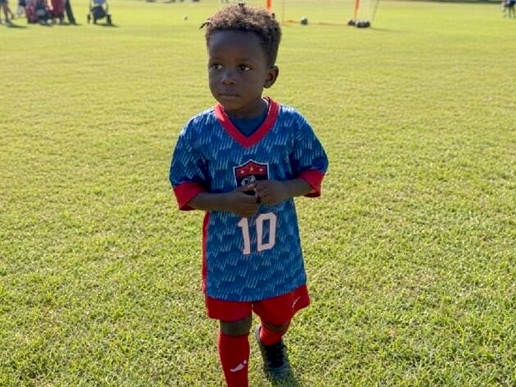 3 year old playing soccer