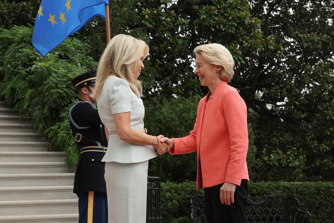 European Commission President Ursula von der Leyen (R) is greeted by U.S. Chief of Protocol Monica Crowley as she arrives at the White House