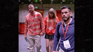 Taylor Swift, Travis Kelce Hold Hands While Leaving Arrowhead Stadium