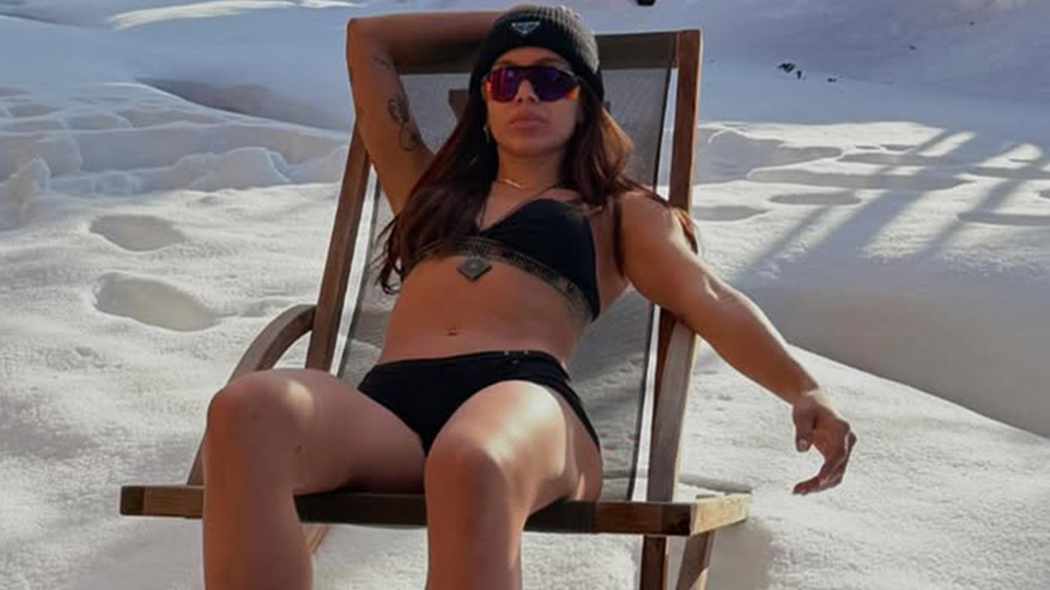 Anitta Strips Down to Bra, Spandex Shorts During Snowy Mountain Vacation