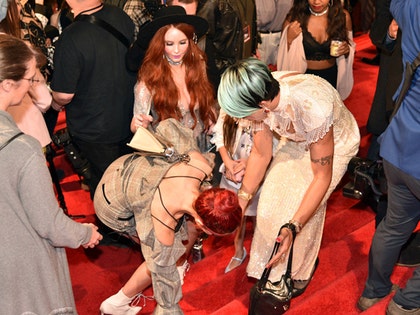 0313_Farah-Abraham_falling_red_carpet_splash-3