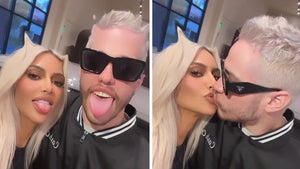 Kim Kardashian and Pete Davidson Share a Kiss with Matching Bleached Hair